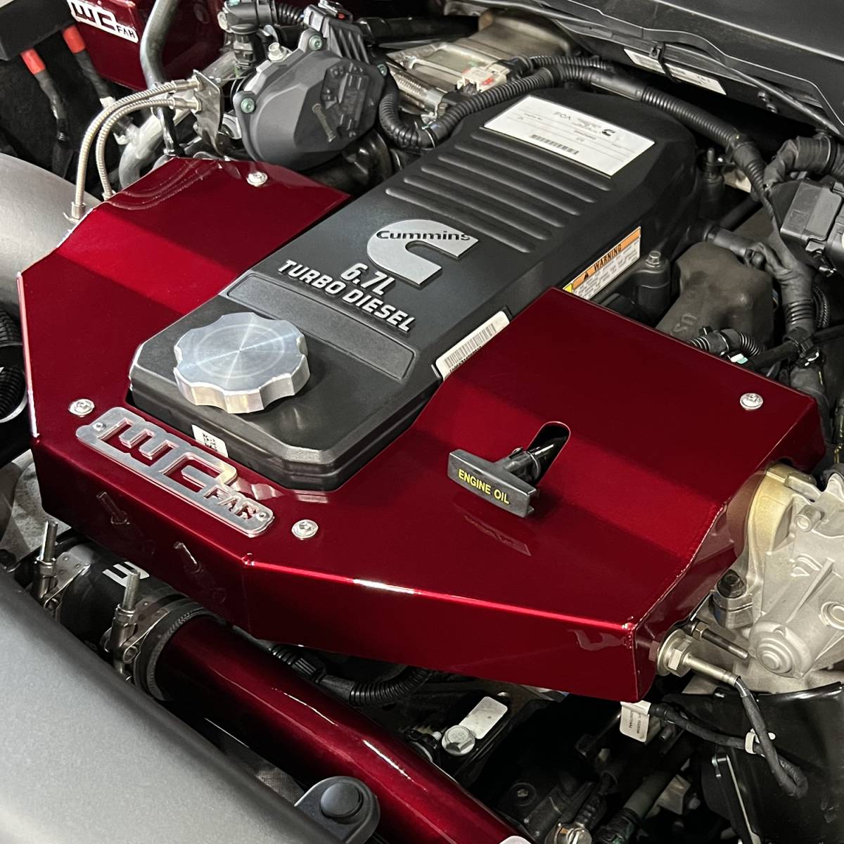 Wehrli engine cover installed on a 2021 Ram 2500 6.7L Cummins