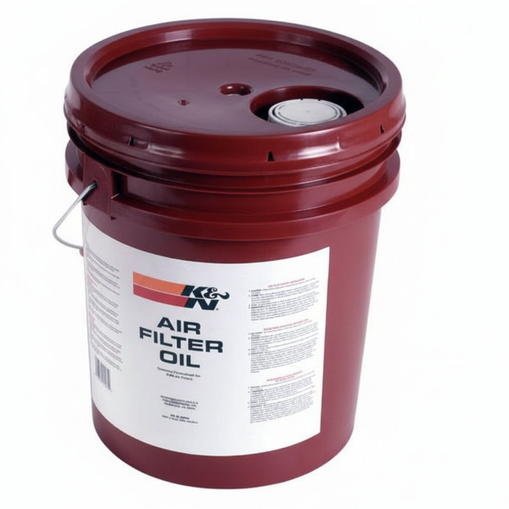 A 5-gallon red bucket labeled 'K&N Air Filter Oil', indicating its use for air filter maintenance.