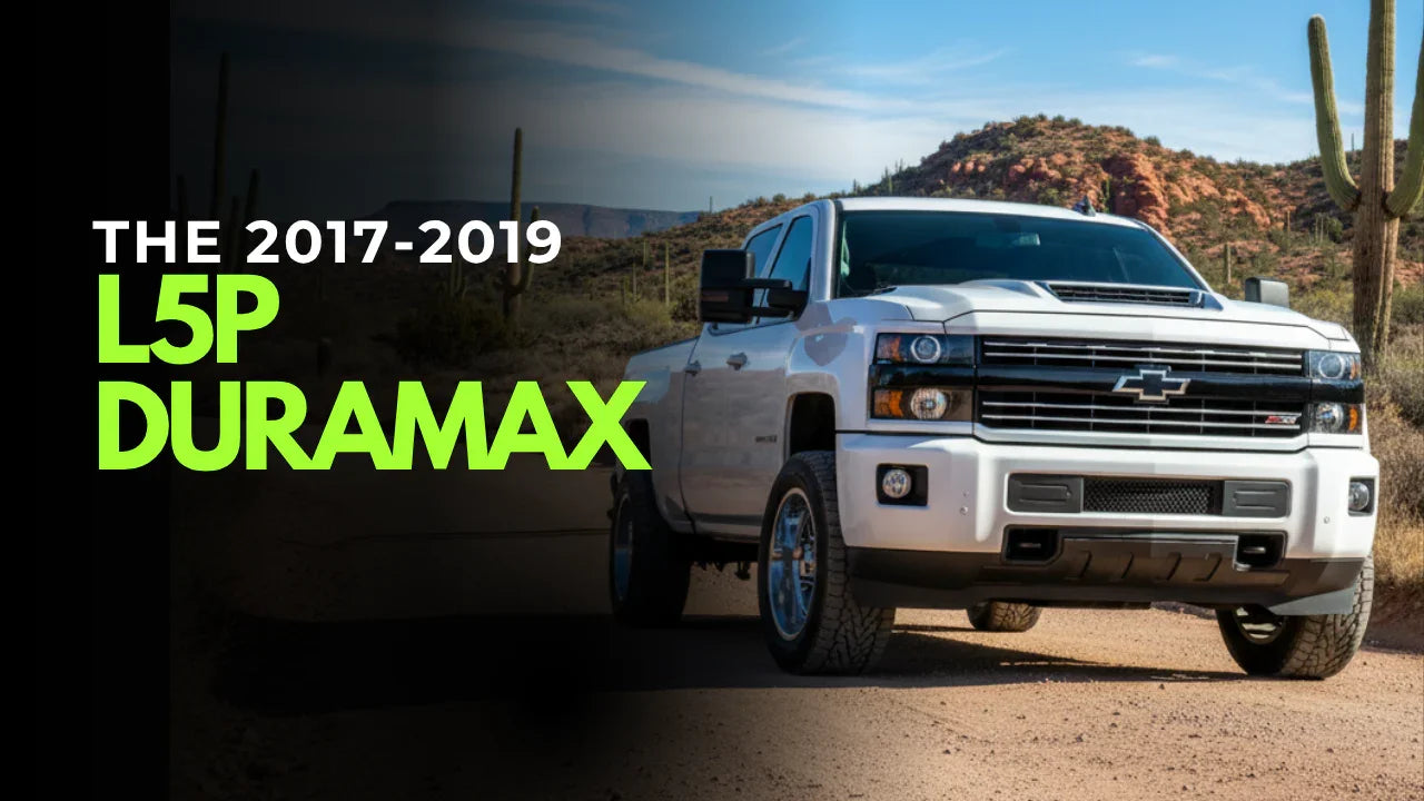 2017-2019 Chevrolet L5P Duramax truck on desert road with mountains and cacti