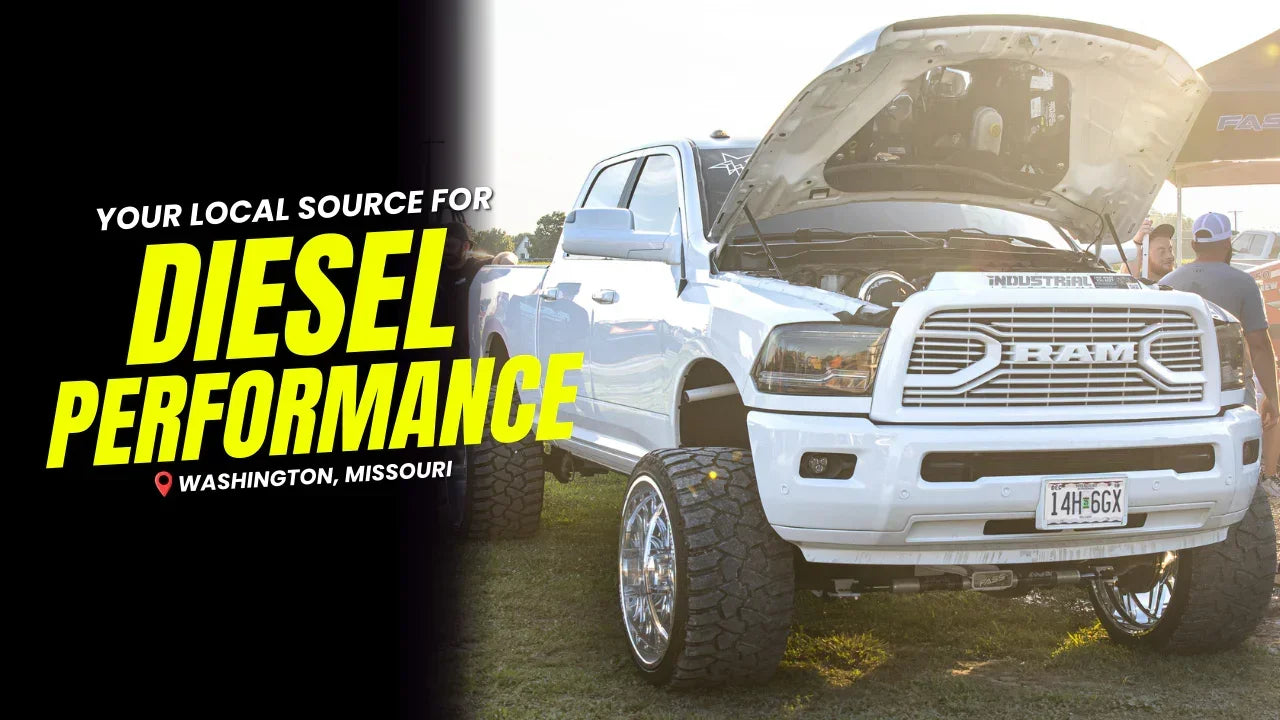 White lifted RAM truck with hood open at diesel performance event in Washington, Missouri