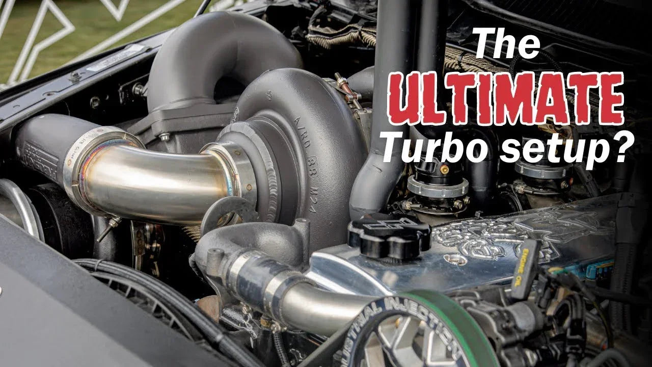 Close-up of a high-performance compound turbocharger setup in a truck engine bay