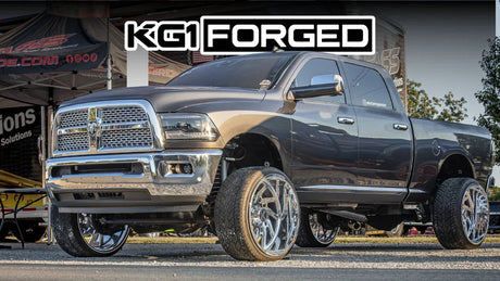 Lifted truck with chrome KG1 Forged wheels at outdoor automotive event