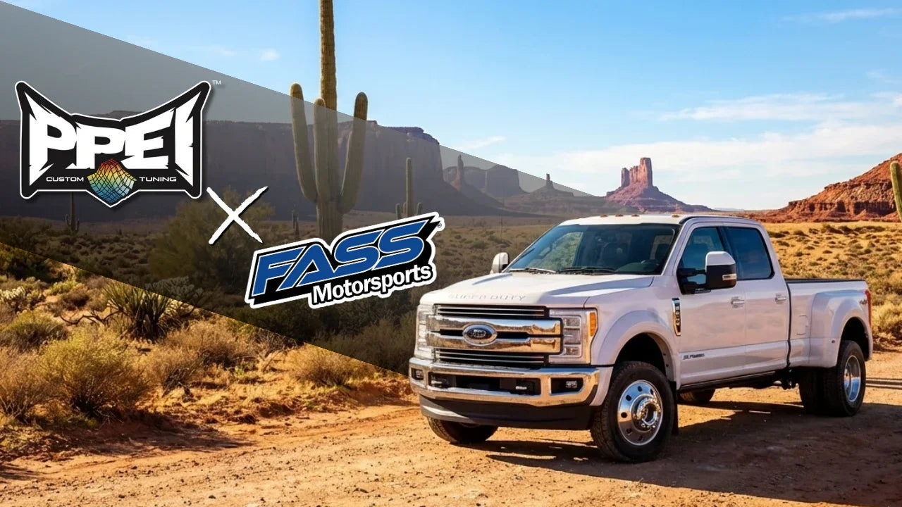 White pickup truck in desert landscape with PPEI Custom Tuning and Motorsports logos