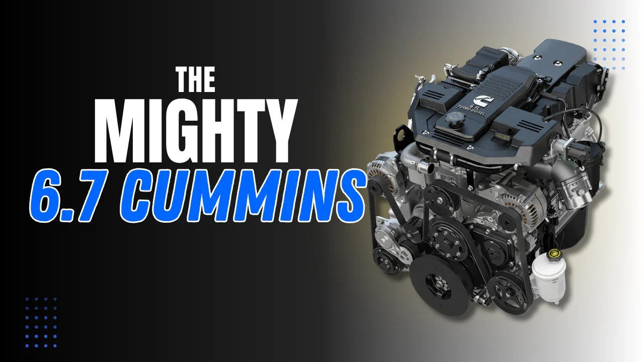 6.7 Cummins turbo diesel engine with text 'The Mighty 6.7 Cummins' on dark background