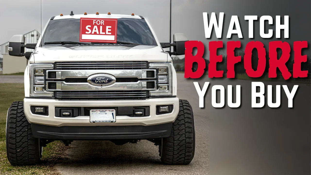 White Ford truck with 'For Sale' sign, bold 'Watch Before You Buy' text overlay