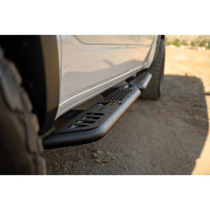 DV8 Offroad 19-25 RAM 1500 Crew Cab OE Plus Side Steps - Black Steel