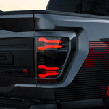 AlphaRex 2024-2025 Ford F-150 LUXX LED Taillights Blk-Red Activ Light/Seq Signal - Smoked Lens