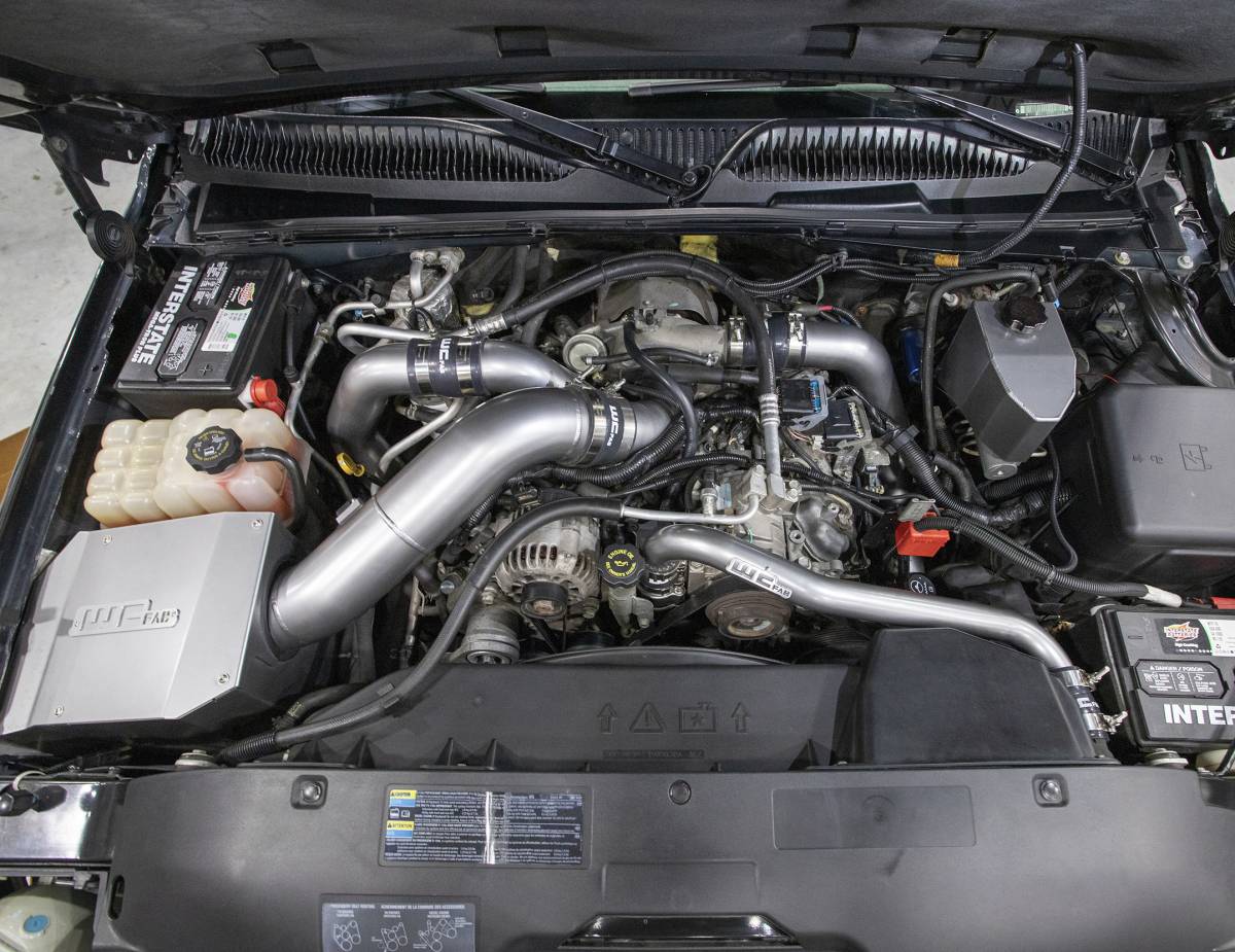 Wehrli billet thermostat housing kit installed on a LB7 Duramax, Gun Metal finish