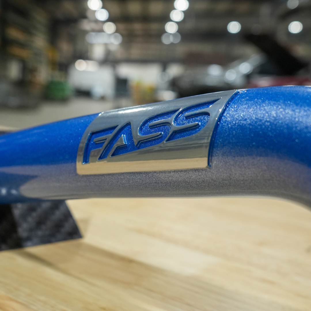 FASS Fabrication upper coolant tube FASS logo plate close-up